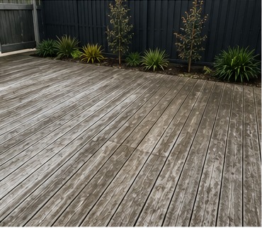 Weathered timber deck before restoration